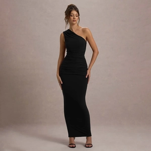 Detail of elegant black one-shoulder dress with gathered waist and slim fit texture