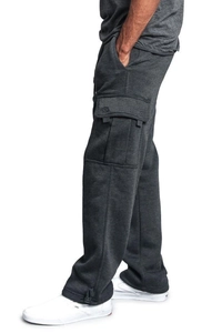 Detail of charcoal grey cargo sweatpants showing side flap pocket and drawcord cuff detail