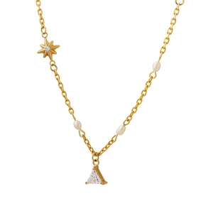 Vintage gold star pendant necklace with cubic zirconia and pearls on white background