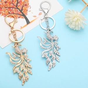Sparkling crystal peacock metal keychain in gold and silver finish with rhinestones