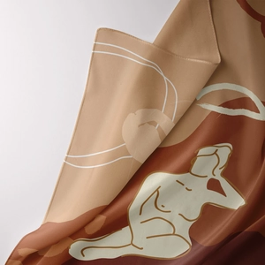Close-up of bohemian tapestry detail with abstract female line art and warm earth tones
