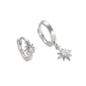 Detail of silver star dangle earrings featuring sparkling zircon stone and hoop design