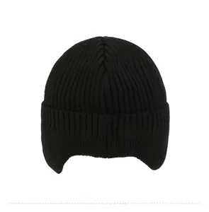 Back view of thick ribbed knit hat with ear flaps for winter warmth in solid black