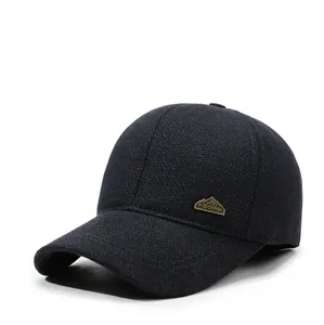 Detailed view of the warm winter baseball cap with golden China mountain badge