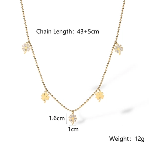 Detailed view of gold clover pendant necklace with chain length and size measurements