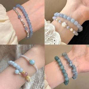 Handmade beaded bracelet set with natural aquamarine, pearls, and floral camellia charms