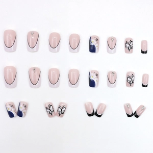 French style press-on nails with butterfly, daisy patterns and rhinestones