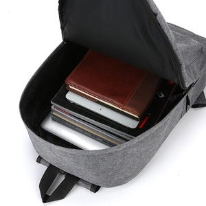 Durable gray canvas travel backpack with large capacity and laptop compartment