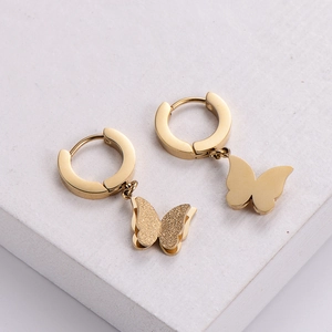 Minimalist gold butterfly hoop earrings with matte and polished wings for women