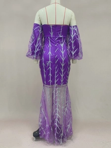 Rear view of purple mermaid gown with silver sequins and long puff sleeves details