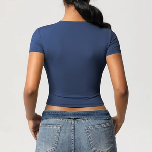 Slim fit navy blue sports crop top showing athletic back cut and high elasticity fabric