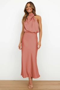 Detailed view of elegant pink satin sleeveless dress featuring a high halter neckline