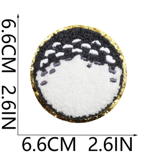 Macro detail of 6.6cm round Totoro chenille embroidery patch with gold glitter edge