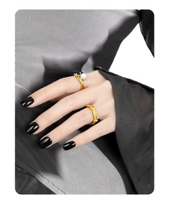 Detailed view of irregular gold S925 silver rings with freshwater pearls on hands