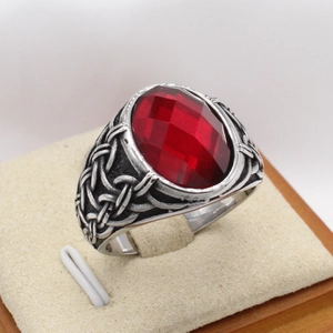 Vintage Viking ring for men with oval faceted red gemstone and Celtic knot silver band