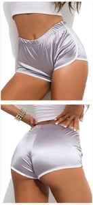 Front and back views of silver satin athletic shorts showing metallic fabric detail