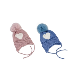 Pink and blue knitted baby hats with heart pattern, earflaps, and pompom decor