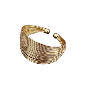Elegant gold plated multi-layer textured open cuff bracelet with minimalist metallic finish