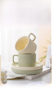 Detailed close-up of Nordic ceramic coffee cup set with vertical ribbed texture