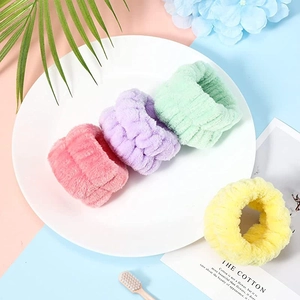Absorbent flannel wristbands for face washing in pink, purple, green and yellow