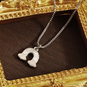Minimalist cloud rainbow necklace with white shell pendant on vintage gold frame