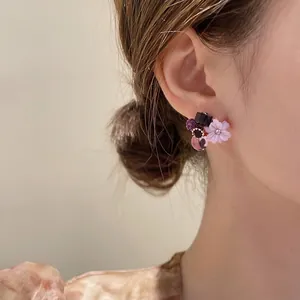 Sweet purple flower earrings with cat-eye stone and crystal for an elegant look