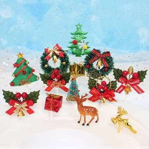 Golden Christmas cake topper set with festive felt reindeer and wreath decorations