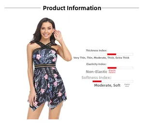Vista dettagliata del costume con gonna in mesh, scollo a incrocio e stampa floreale