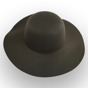 Macro shot of dark brown wool felt wide brim hat showing fine matte texture and rounded top