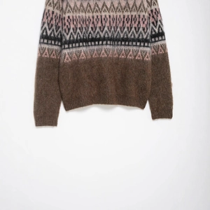 Fashionable retro Fair Isle crewneck knit sweater with fuzzy texture and jacquard pattern