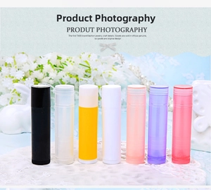 Detailed view of empty 5g lip balm tubes in various colors with twist-up base
