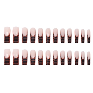 French tip press-on nails with orange and black crocodile texture in long coffin shape