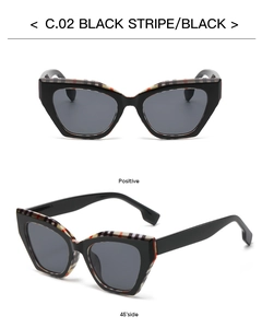 Detail view showing C.02 black cat eye sunglasses with classic plaid stripe pattern