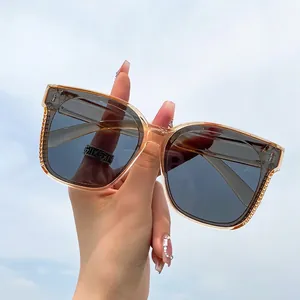 Polarized fit-over night vision sunglasses with champagne frames and grey lenses