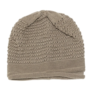 Close-up of the raised granular texture and mixed yarn knitting on this winter beanie