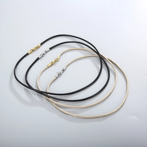 Braided leather cord necklaces in black and beige colors with gold and silver lobster clasps
