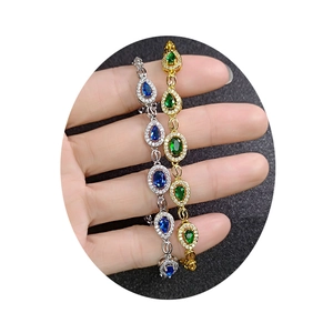 Elegant emerald and sapphire teardrop bracelets in silver and gold plating