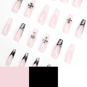 French ballet press-on nails with black and white marble tips and silver cross charms