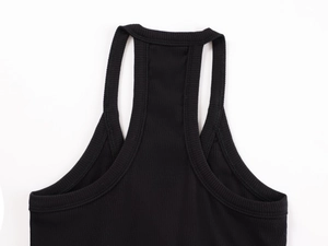 Detailed close-up of black ribbed knit racerback tank top with high-quality stitching