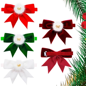 Detail of Christmas velvet pet bow ties in four colors with back clip structure