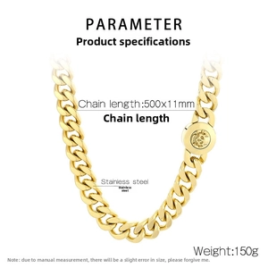Close-up of 11mm gold stainless steel Cuban chain with a skull engraved buckle