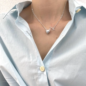 925 silver heart necklace with OT toggle clasp shown on model with light blue shirt