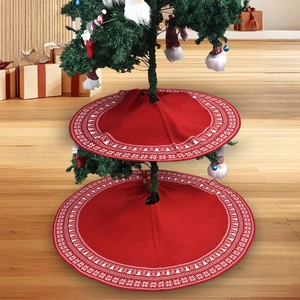 Classic red Christmas tree skirt with white knitted snowflake and tree patterns