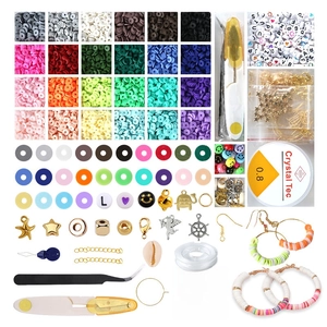 Detailed view of DIY bead kit including colorful clay discs, metal charms, and tools