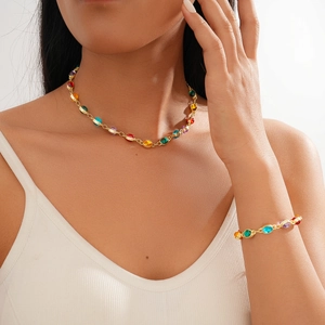 Ethnic style golden jewelry set with colorful oval resin stones for women