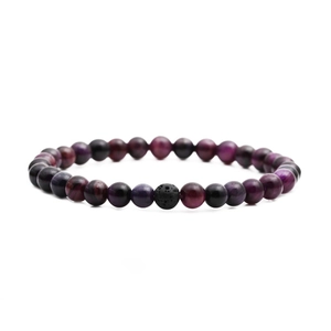 Purple marble texture beaded bracelet with a black volcanic stone on white background