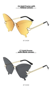 Detail of butterfly rimless sunglasses with metal chain temples in brown and grey lenses