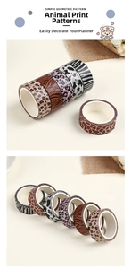 Macro detail of six animal print washi tapes featuring leopard, zebra and tiger patterns