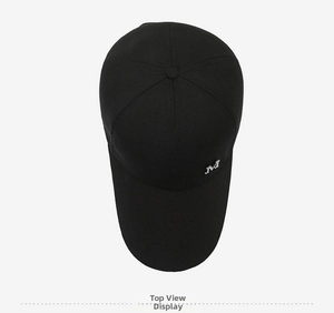 Top down view of black cotton baseball cap showing reinforced seams and metal M logo
