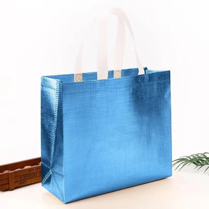 Glossy sky blue metallic tote bag made of laminated non-woven fabric with white handles